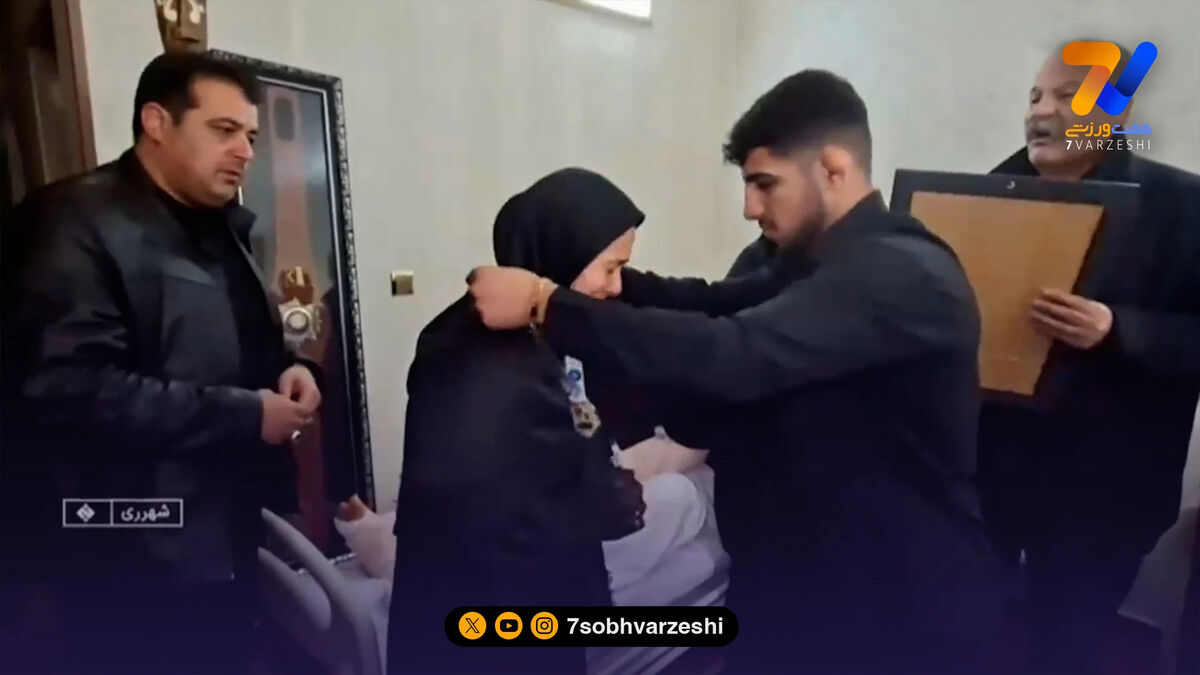 قهرمان کشتی ایران مدال خود را به شهدای جنگ رمضان تقدیم کرد