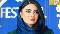 انتخاب جسورانه لیندا کیانی در استایل؛ مانتو روشن و شال قرمز! + عکس